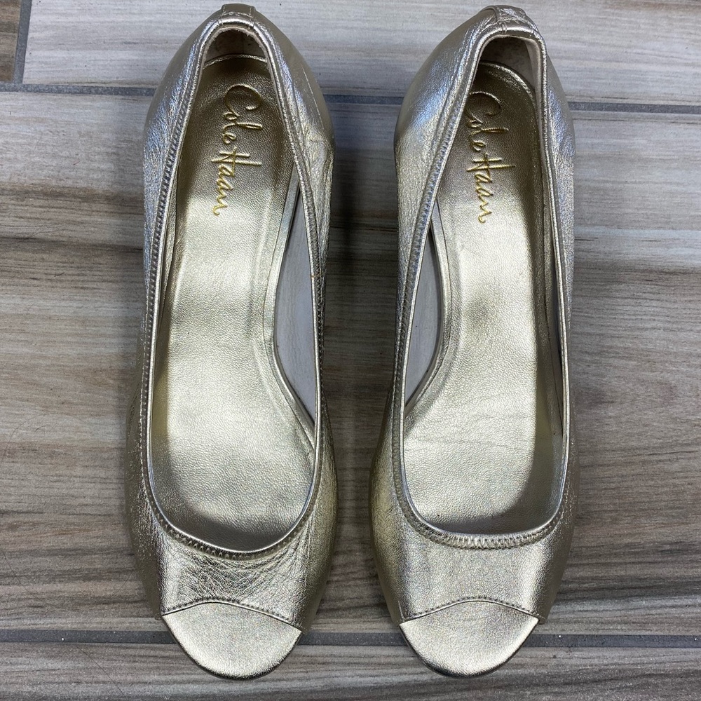 Cole Haan Nike Air peep toe gold wedge.